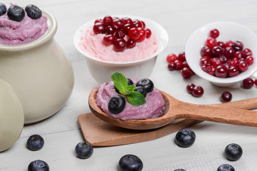 Yogurt on a wooden spoon