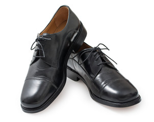 Pair of elegant mens shoes. Fashion black shiny leather. Isolate