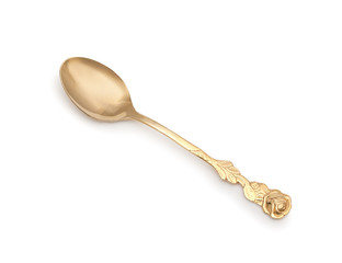 Vintage golden teaspoon with rich decorated handle in shape of r