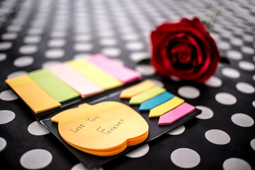 Naklejka na ściany i meble Post-it with message love you forever. Collection of different colored sheets of note papers and Red Roses flower for Valentine Day . Customize colors Vintage retro and old film Tone