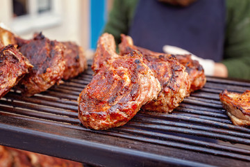 Pork loin steak on the hot barbecue charcoal grill
