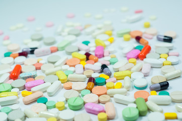 assorted pills and capsules in medicine