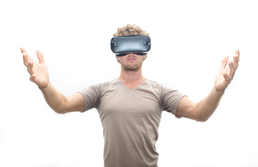 man in gray T-shirt wearing virtual reality 3D headset and exploring the play.isolated on white