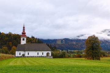 Fototapeta premium Typical slovenian church in the mountains