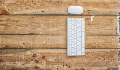 Business concept photo. Modern keyboard and mouse vintage old wooden background.