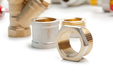 Set of metal-plastic plumbing couplings, adapters, plugs isolated on white background