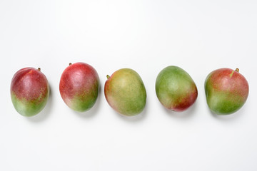 Close-up of mango fruit, isolated on white background