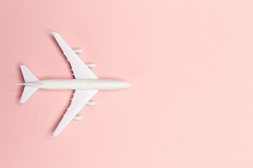 airplane on color background