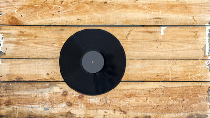  Vinyl record on vintage wooden board