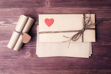 Valentine's day concept with envelop, scrolls and heart