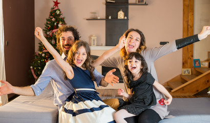 Happy family having fun at home.