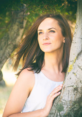 Portrait of beautiful white woman in nature