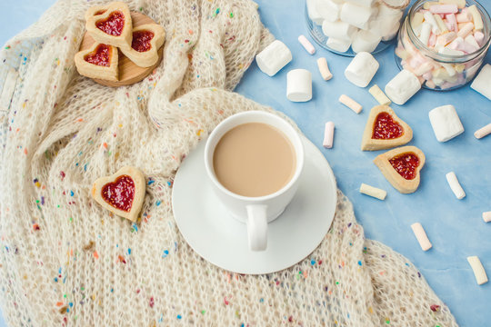cocoa with marshmallows and a cookie heart. Selective focus.  