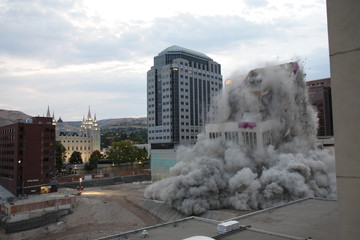 Building demolition with explosives	in downtown city location