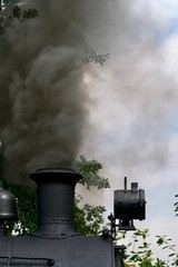 Fototapeta na wymiar dense smoke of a steam train
