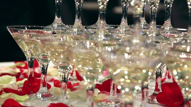 Panorama of champane coctail tower in the luxurious interior with restaurant service