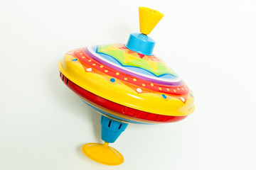 colorful spinning top toy on white background