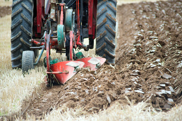 straight furrows of a plough