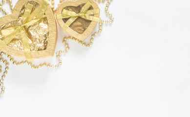 Christmas background. Christmas gift gold boxes and on white background. Top view with copy space.