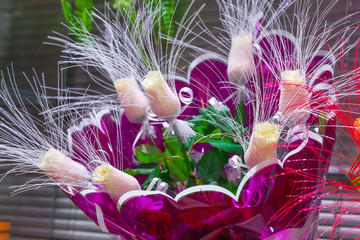 Fototapeta na wymiar Bouquet of roses in a flower shop. Closeup