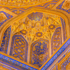 Fototapeta na wymiar Gold mosaic dome in Tilya Kori Madrasah, Samarkand, Uzbekista