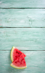 freshly cut water melon on wooden table