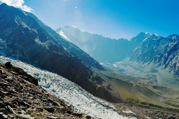 Fototapeta na wymiar Clouds and mountains, Caucas Mountains, Karmadon