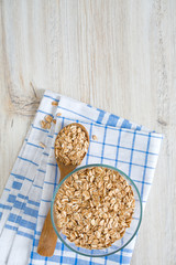 spelt flakes on wooden surface
