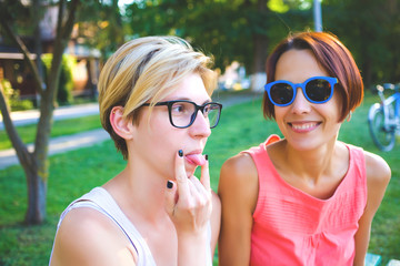 Two girls on the street.