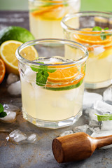 Refreshing summer cocktail with citrus fruits