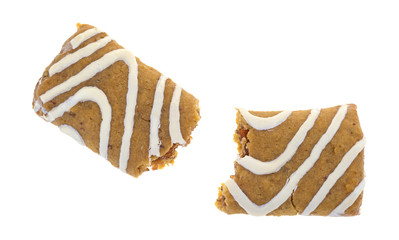 Strawberry filled fruit bar broken in half isolated on a white background.