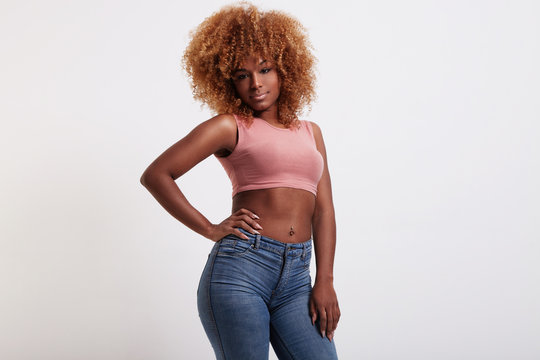 black woman with perfect round shaped blonde afro hair