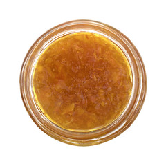 Sugar free orange marmalade in an opened jar isolated on a white background.