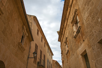 Beautiful narrow old street in mediterranean city.