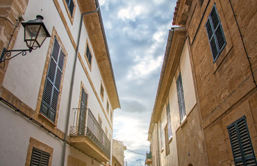 Fototapeta na wymiar Beautiful narrow old street in mediterranean city.