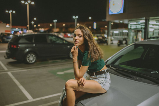 Girl, night and parking