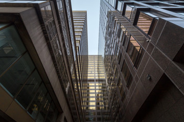 Fototapeta premium Dead-end at the bottom of skyscrapers in downtown Toronto, Ontario, Canada