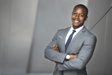 Happy smiling portrait of a successful confident african american corporate executive business man