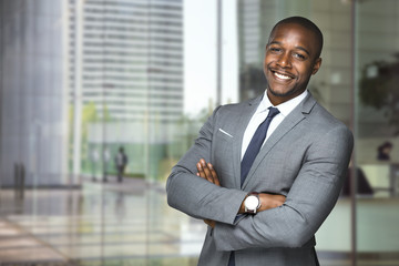 Cheerful big smile from happy executive downtown skyscrapers office workplace 