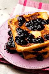 French toast with blueberry sauce.