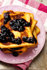 French toast with blueberry sauce.