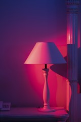 Art Deco Stylish room lamp standing at white table 