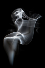 white smoke on black background