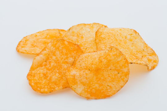 Crisps with paprica on a white background.