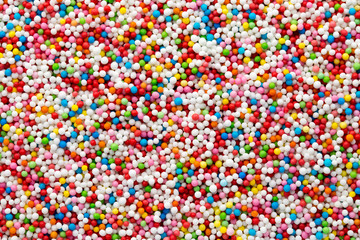 Multicoloured sweet sugar balls. Small ball pattern.