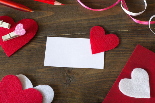 business card with a red heartprepare for the day of lovers