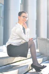 Businesswoman taking a coffee break.