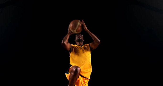 Sportsman playing basketball in basketball court 4k