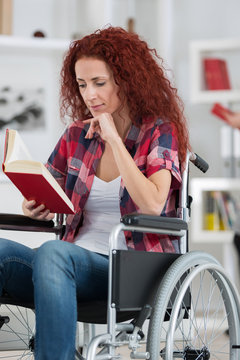 young handicaped woman reading