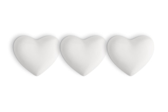 three White love hearts on a white background
